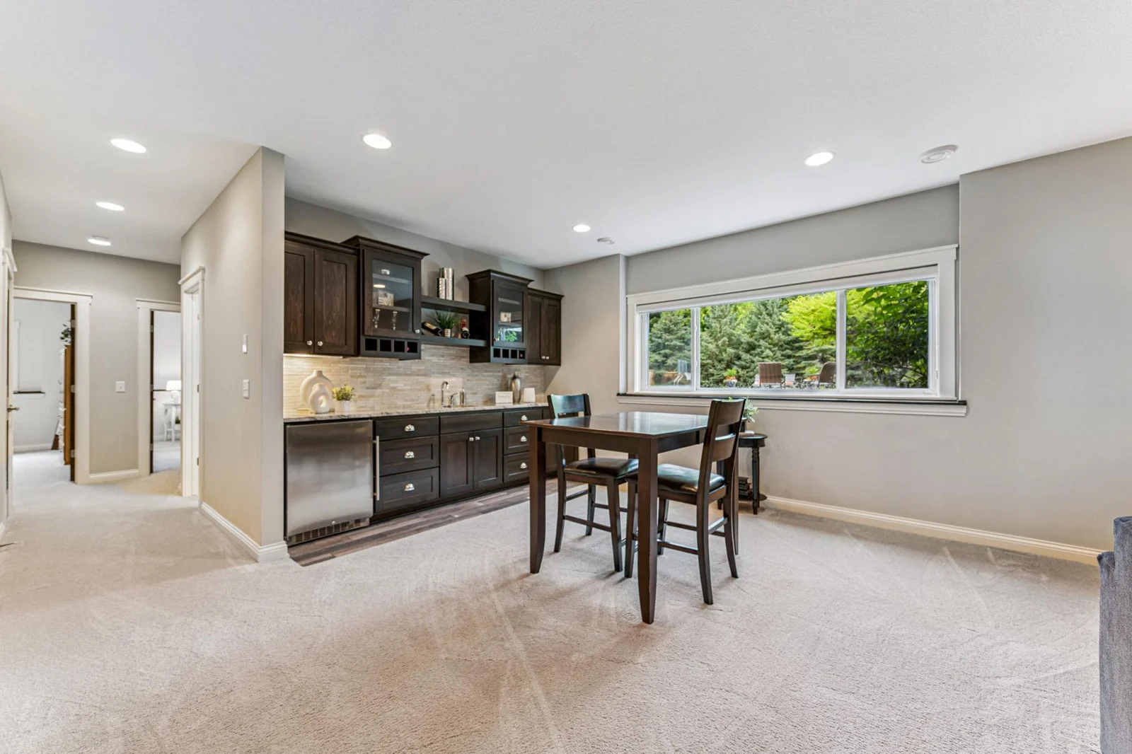 Family room with a wet bar.