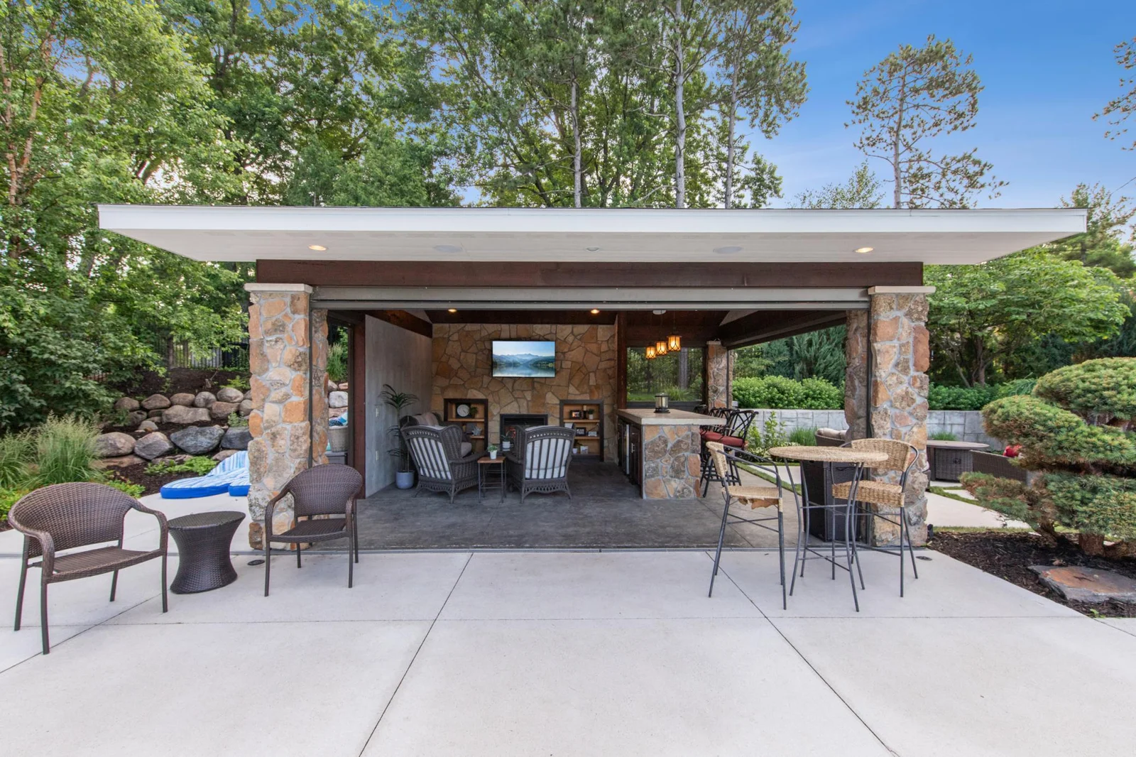 Cabana with gas fireplace and smart screens.