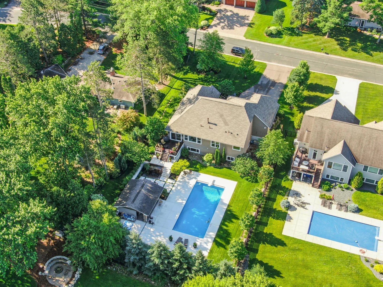 Stunning aerial view showcasing the beautifully landscaped yard.