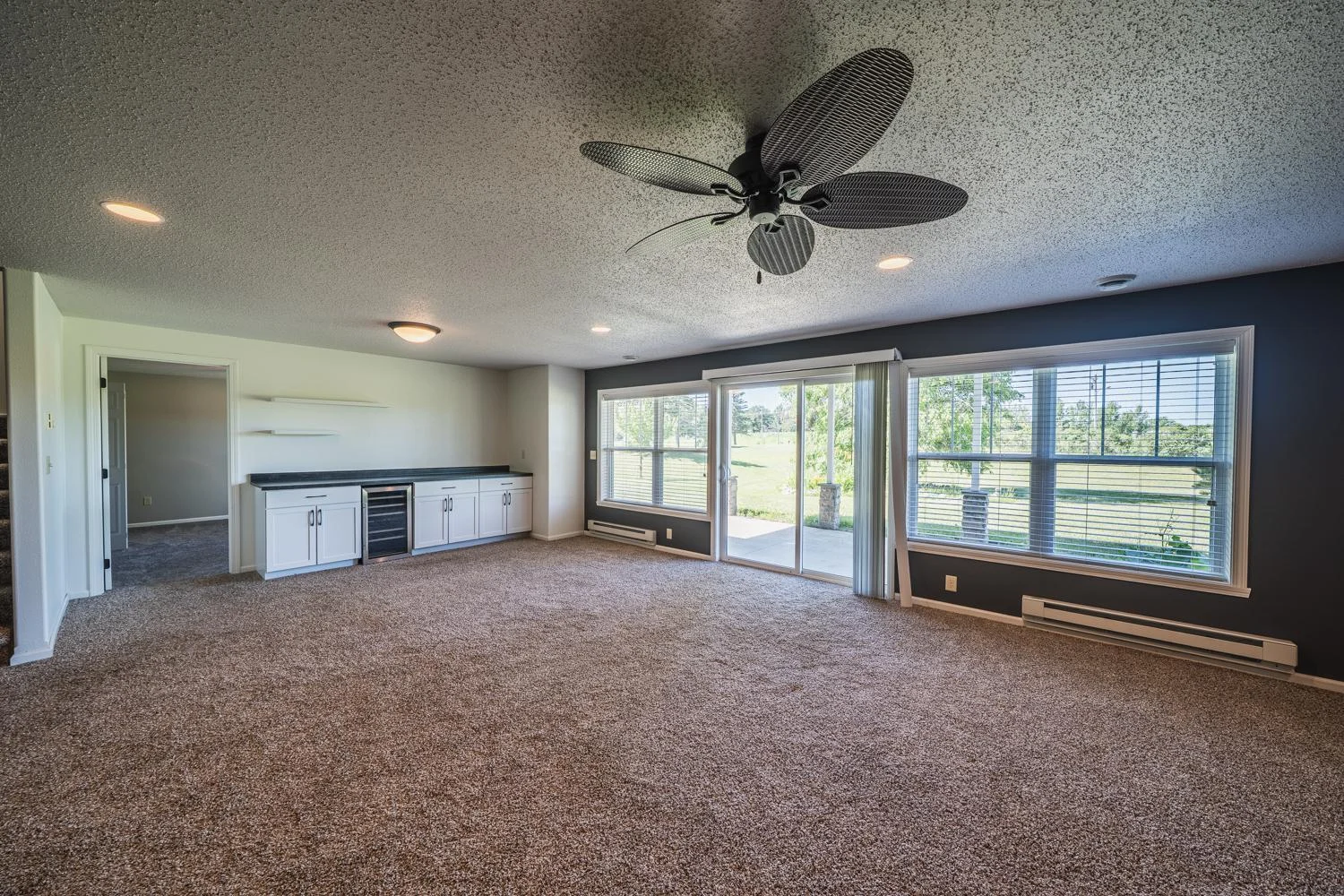 Lower Walkout Fam Room with Wine Frig