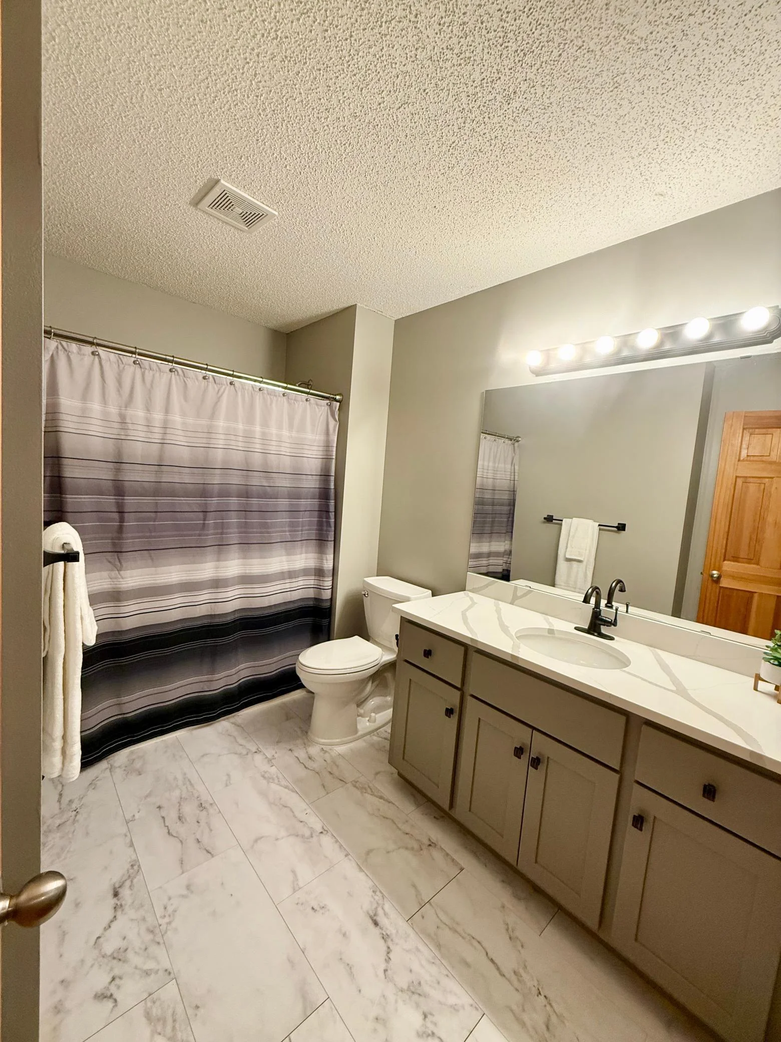 Updated full bathroom.