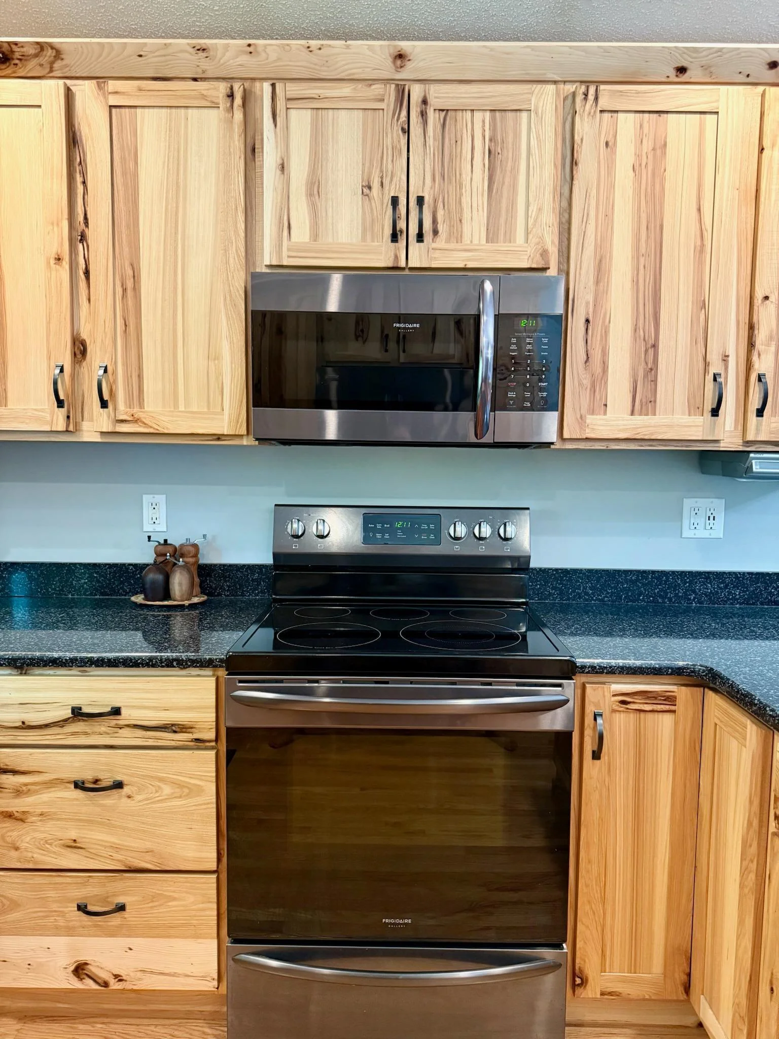 Black stainless steel appliances.