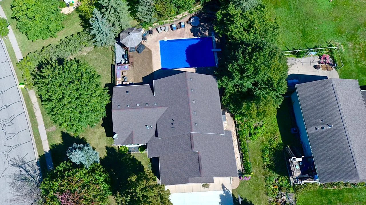 The aerial views of this home are amazing with the fully fenced and landscaped pool area.