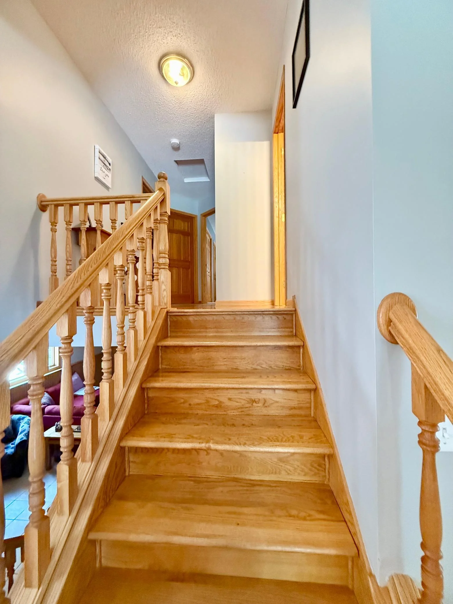 Upper level offers 3 bedrooms and 2 full bathrooms.