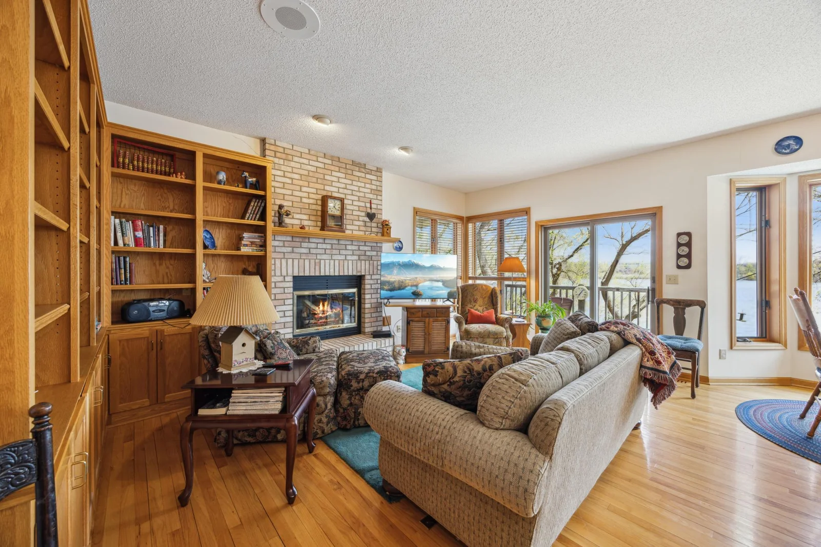 Hearth room has sliding doors to deck.