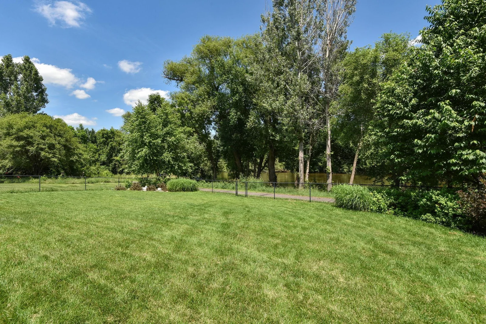 85' of River Frontage on Crow River with Private Views of Crow Hassan Park Reserve with a fully fenced back yard!