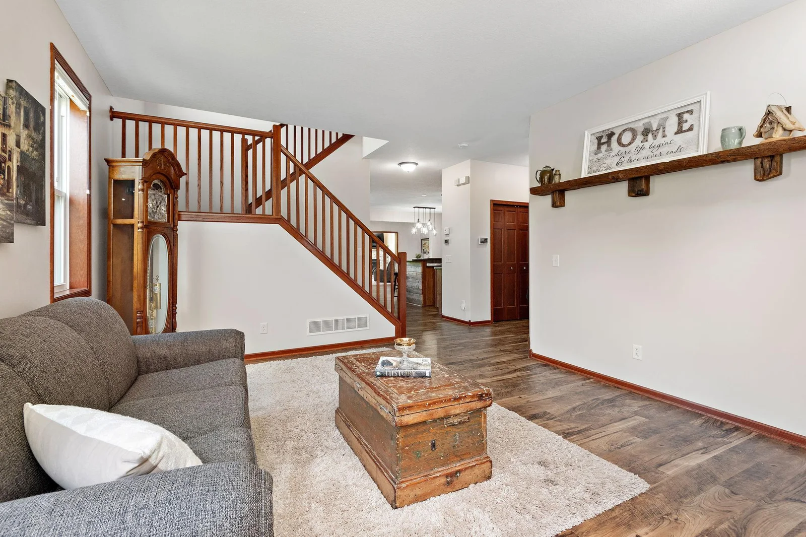 Formal Living Room / Flex Room and entry with open staircase to upper level!