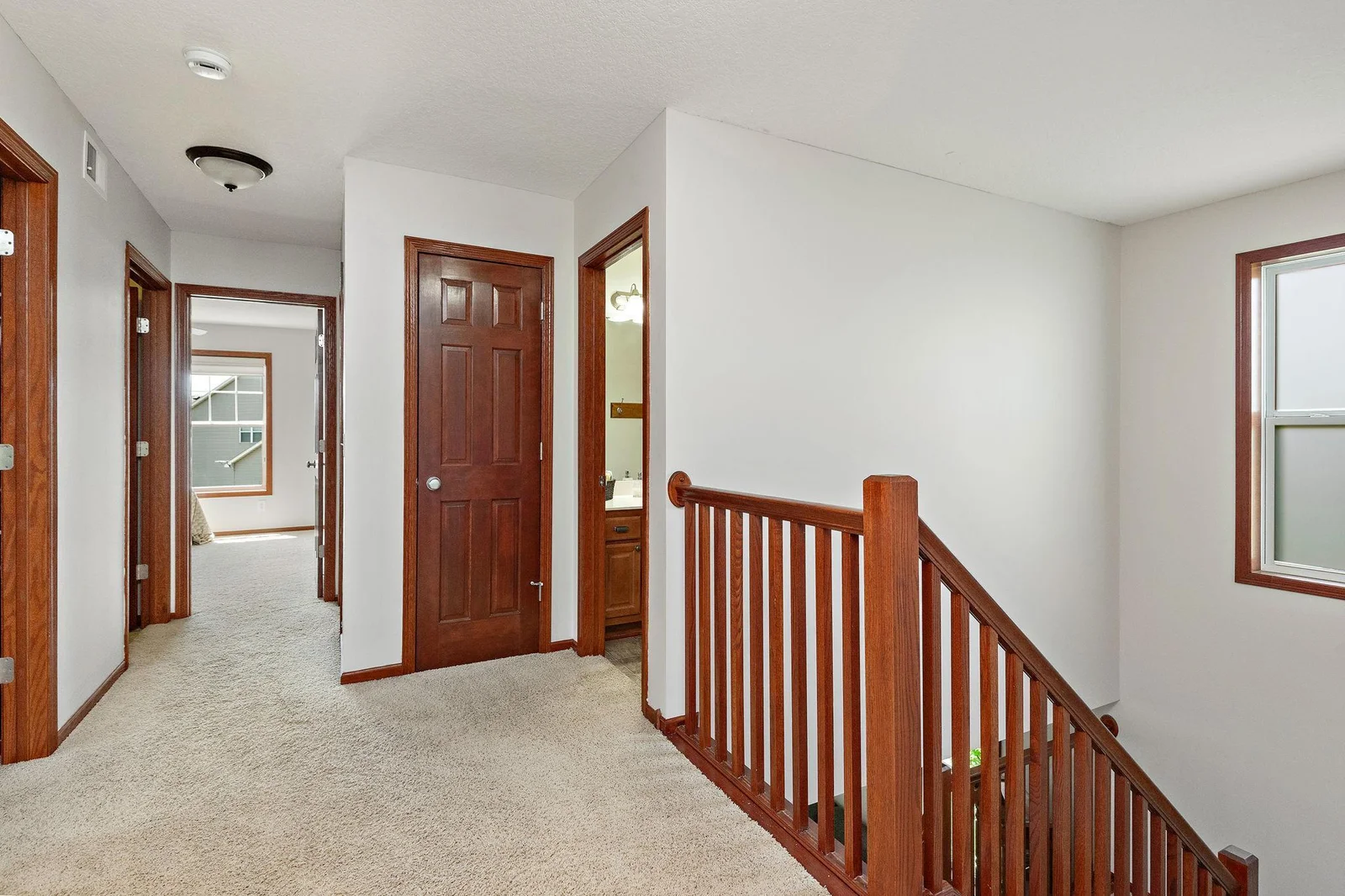 Upper Level Open Staircase freshly painted throughout!