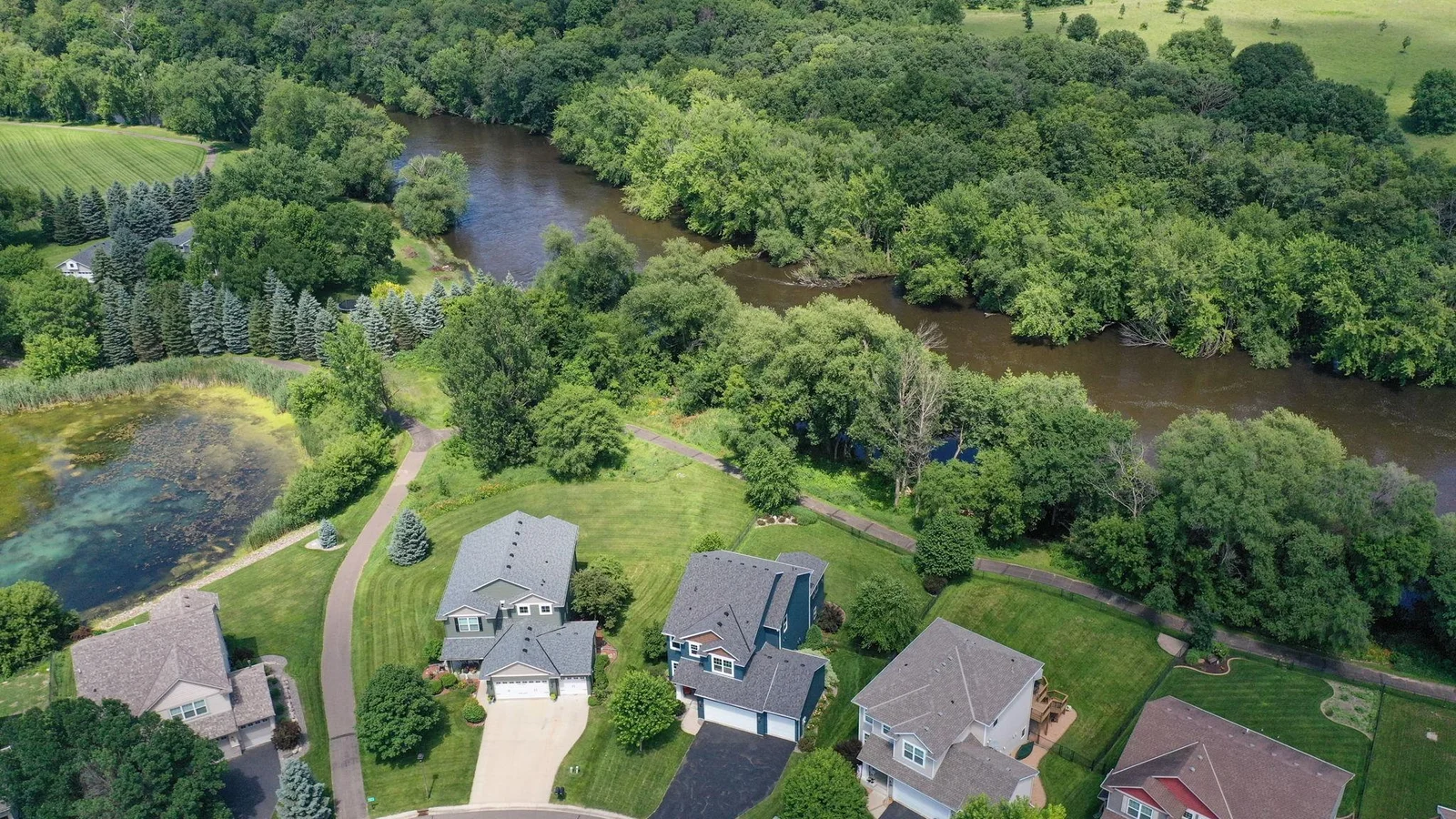 WOW!! This Spectacular Riverfront Executive Walkout 2 Story will truly Amaze you! 85' of River Frontage on Crow River with Private Views of Crow Hassan Park Reserve with a fully fenced back yard - lots of privacy!!