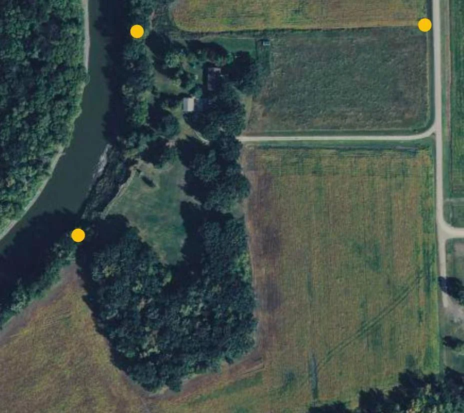 Yellow property stakes are visiable on the property
