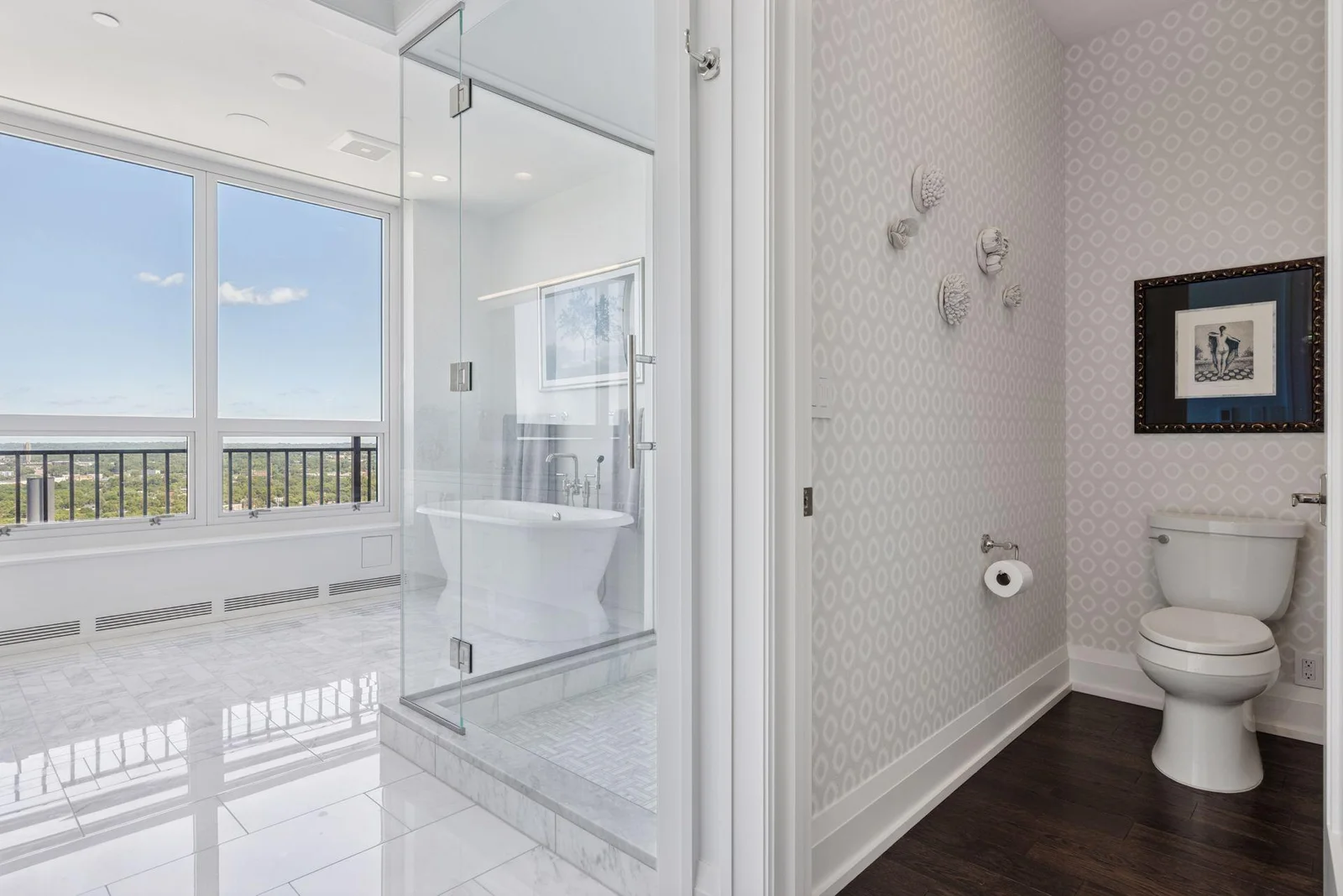 Spa-like primary bathroom with radiant heat marble floors