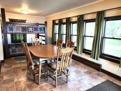 Dining area with extra sleeping area.