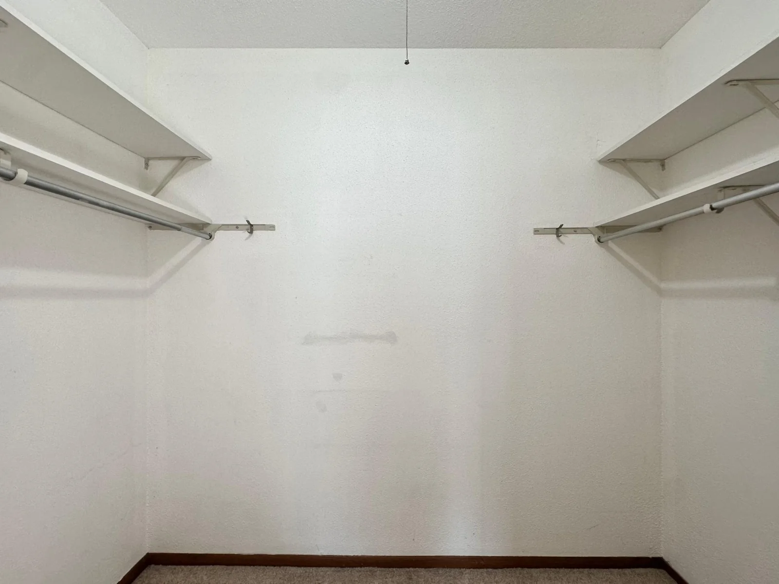 Primary Bedroom walk-in closet