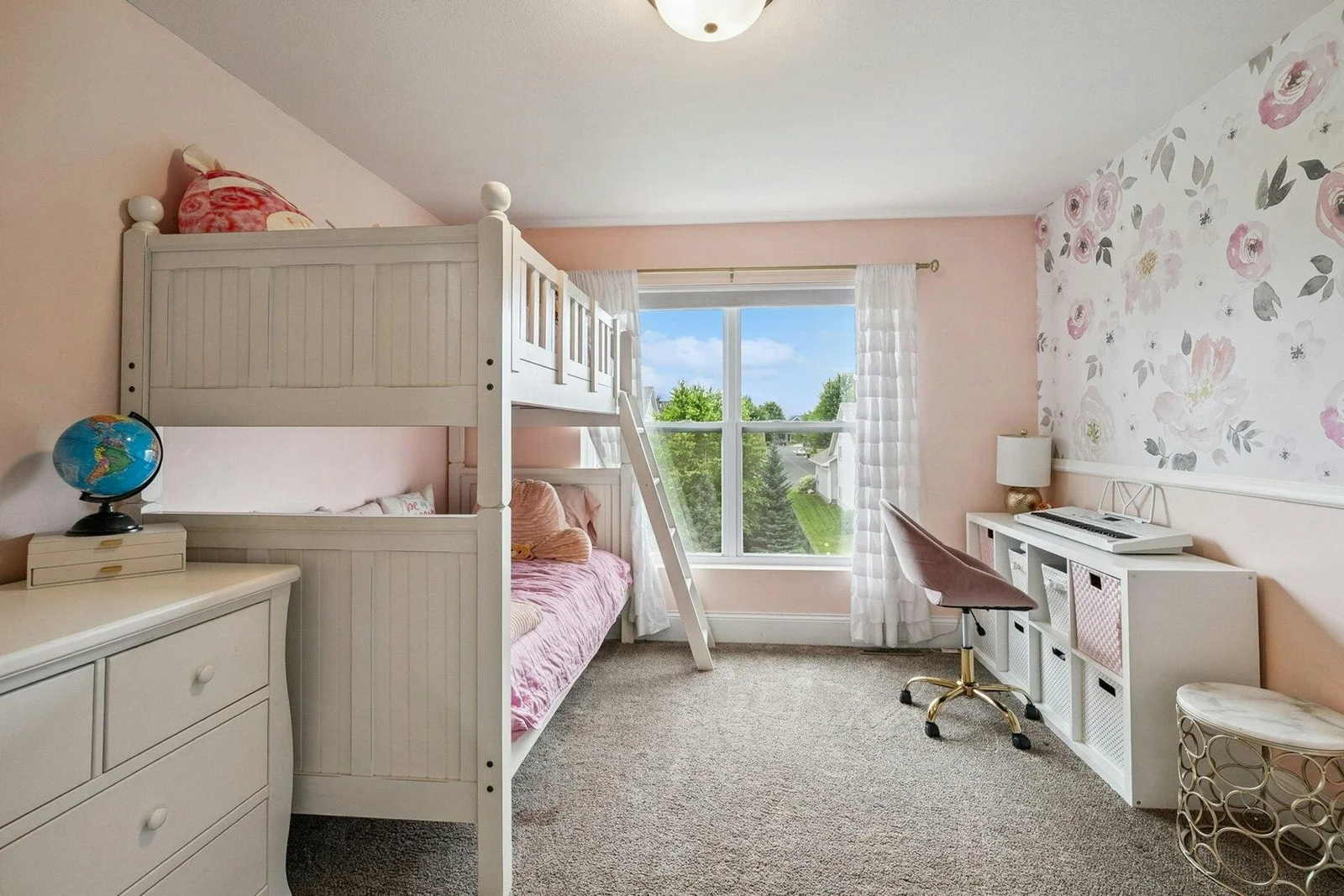 One of three additional bedrooms on the same level