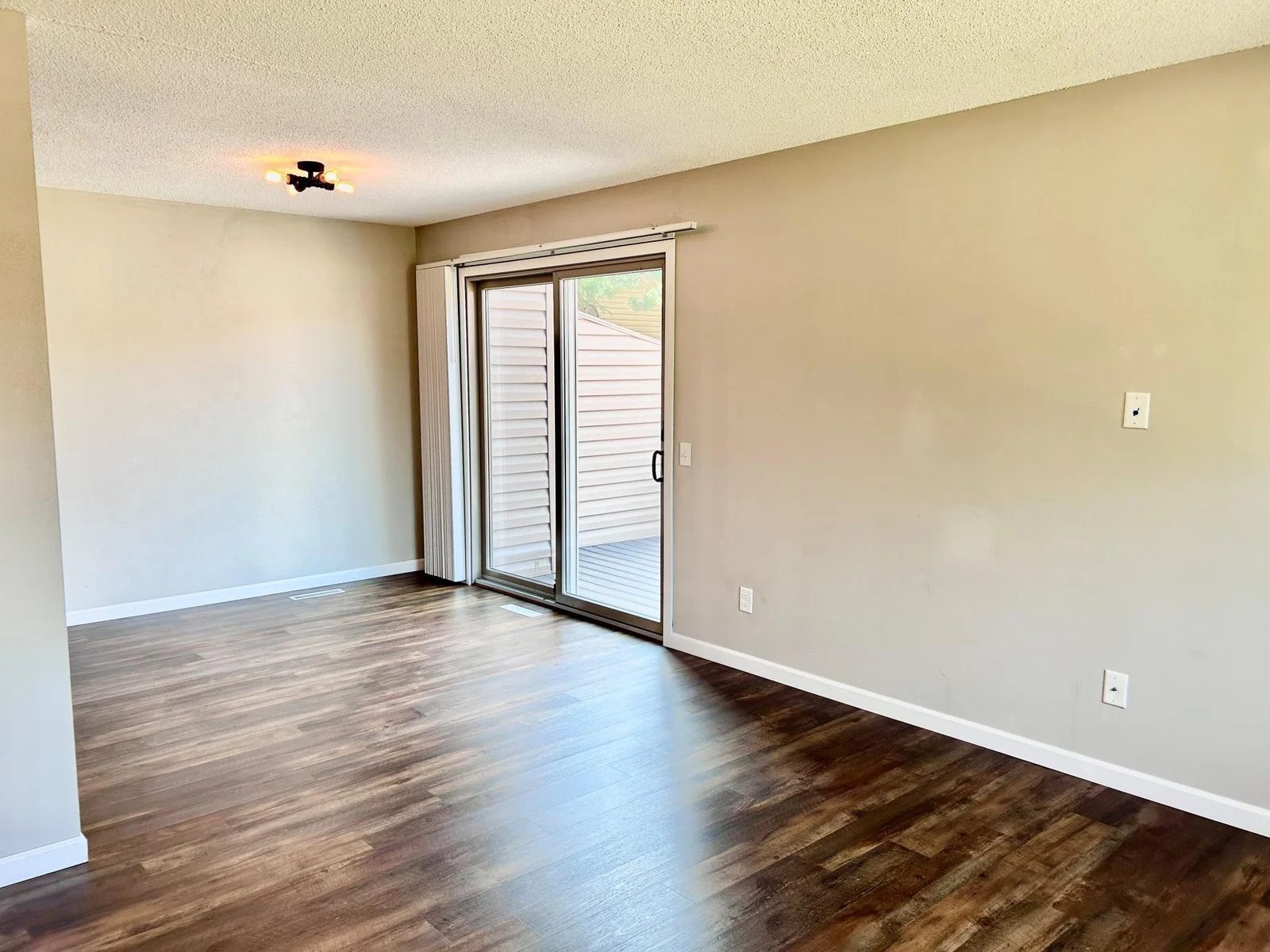Family room looking toward patio door to deck