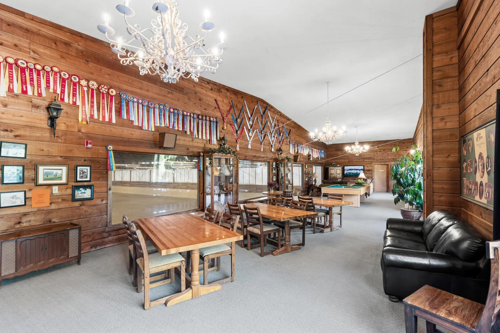 Upper Level Lounge (19' x 68') - 5 large picture windows looking into the Indoor Arena - access to Office and full Kitchen