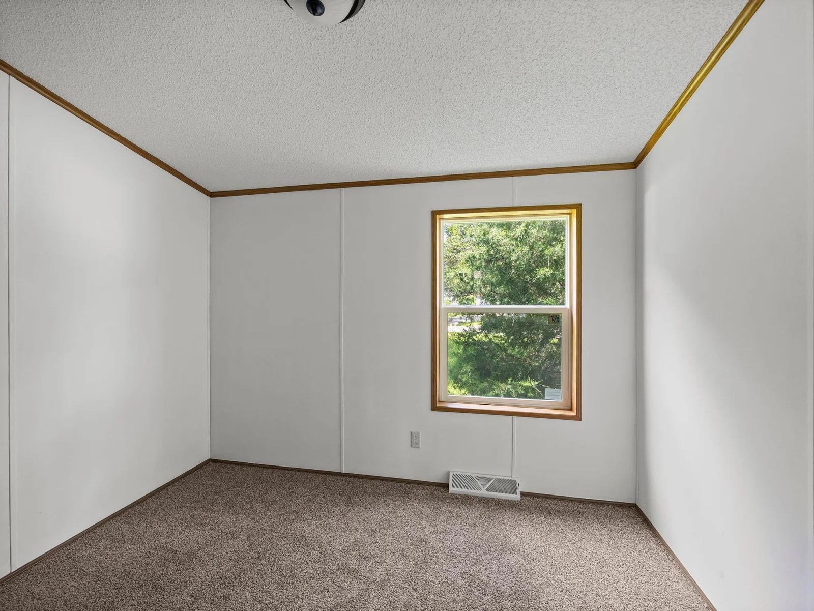 The second of two bedrooms.