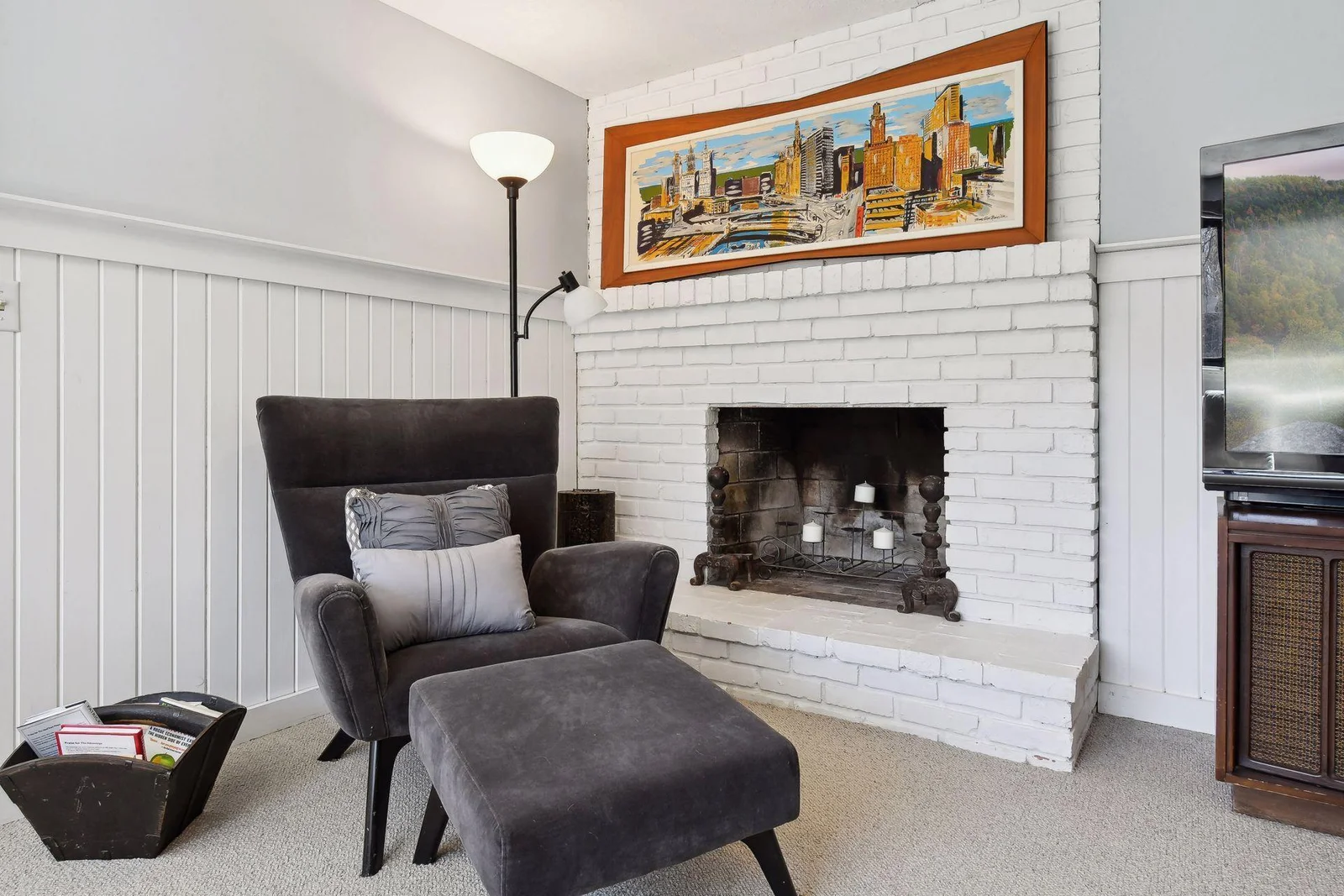 Another cozy fireplace, this one wood burning