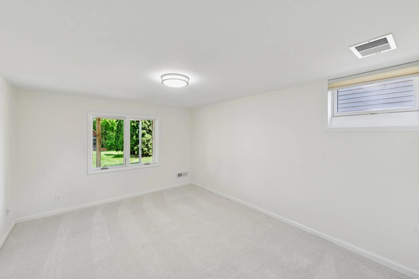 Lower level fourth bedroom is a great size!