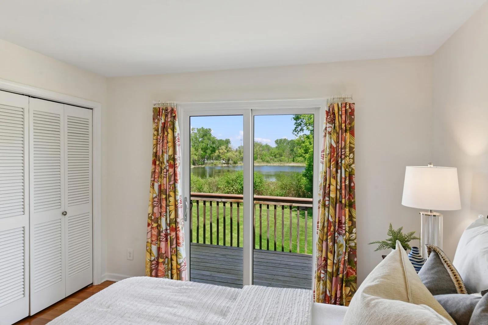 Access the deck right from the primary bedroom, or lay in bed and enjoy the view