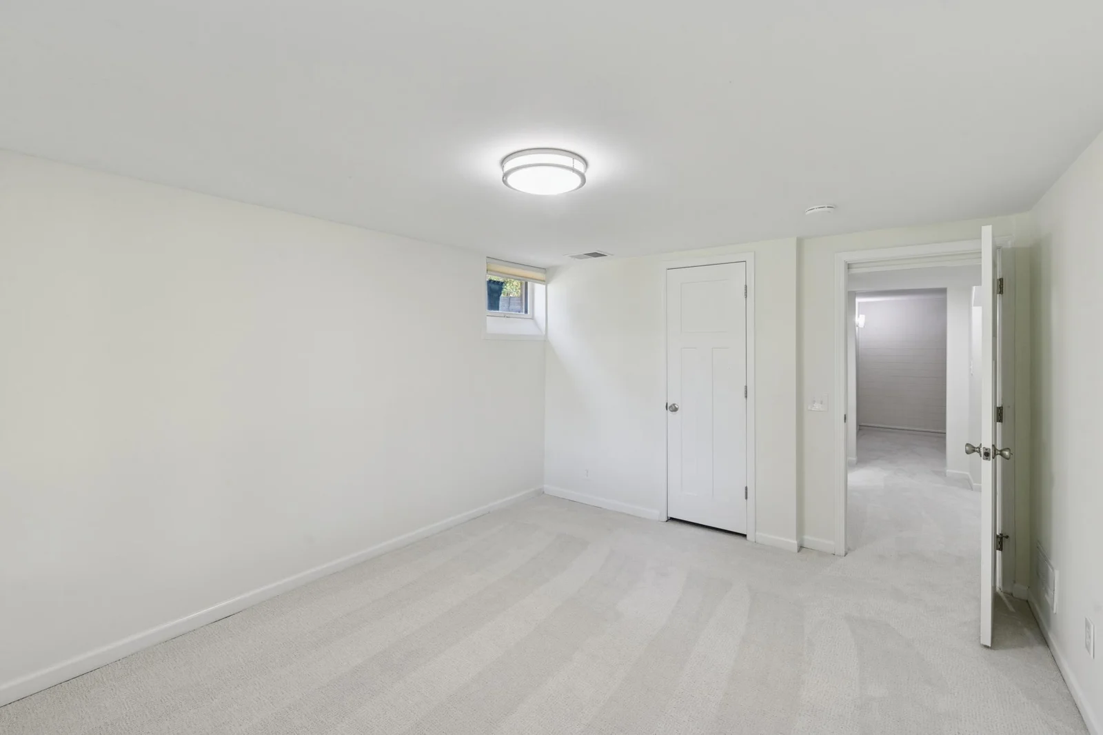 Lower level fourth bedroom is a great size!
