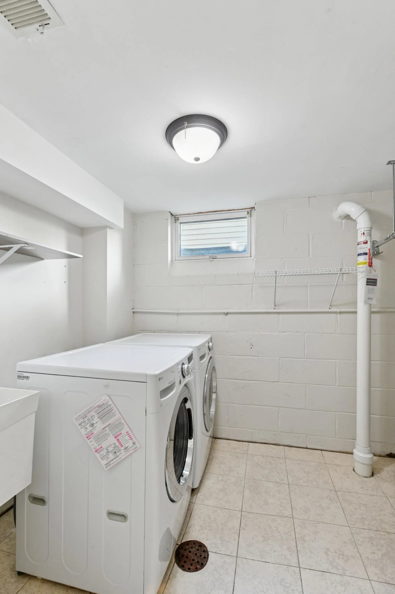 Laundry room with great storage and radon system