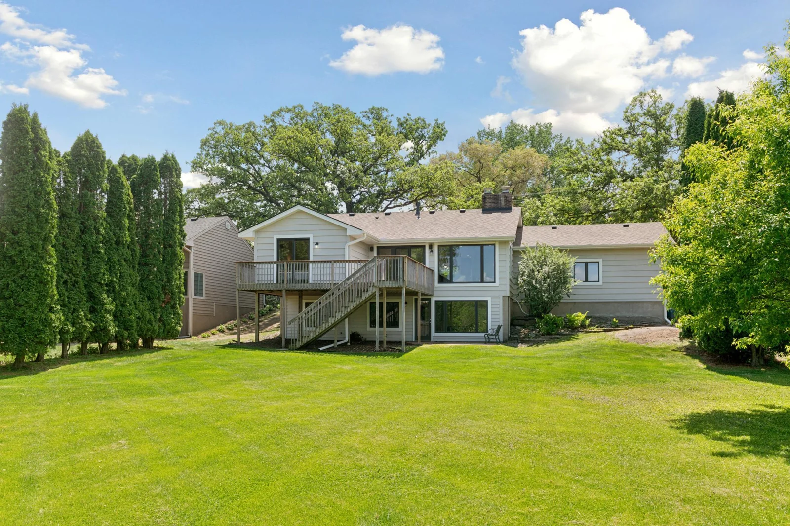 Wrap around deck offers access from both dining room and primary bedroom