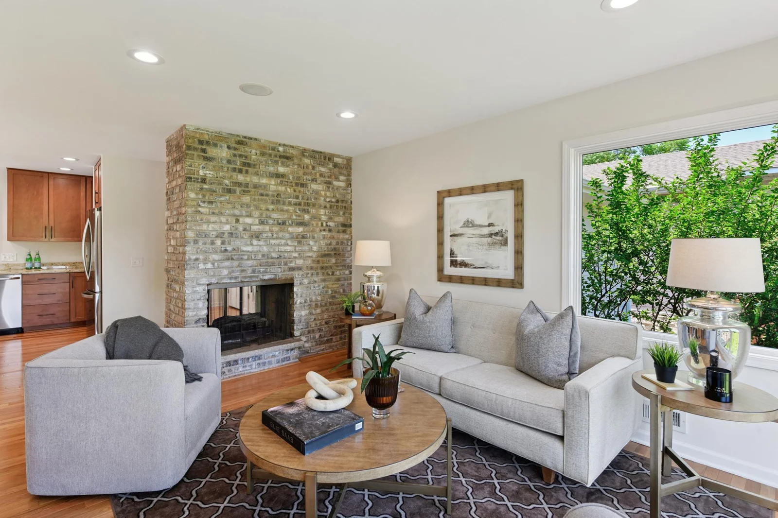 Cozy up to the double sided gas fire place in the winter while enjoying the pond views