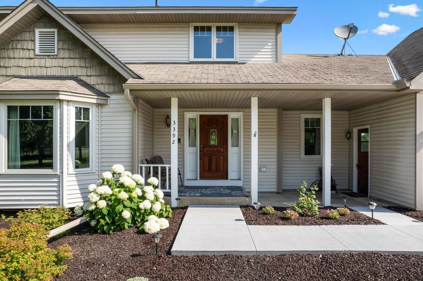 New sidewalk and landscaping