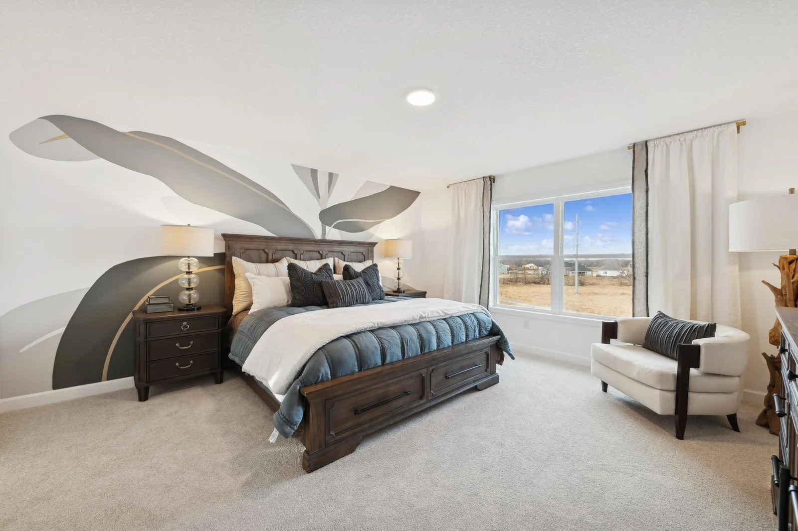 (Photo of decorated model, actual homes finishes will vary) Find your retreat in the stunning primary bedroom!