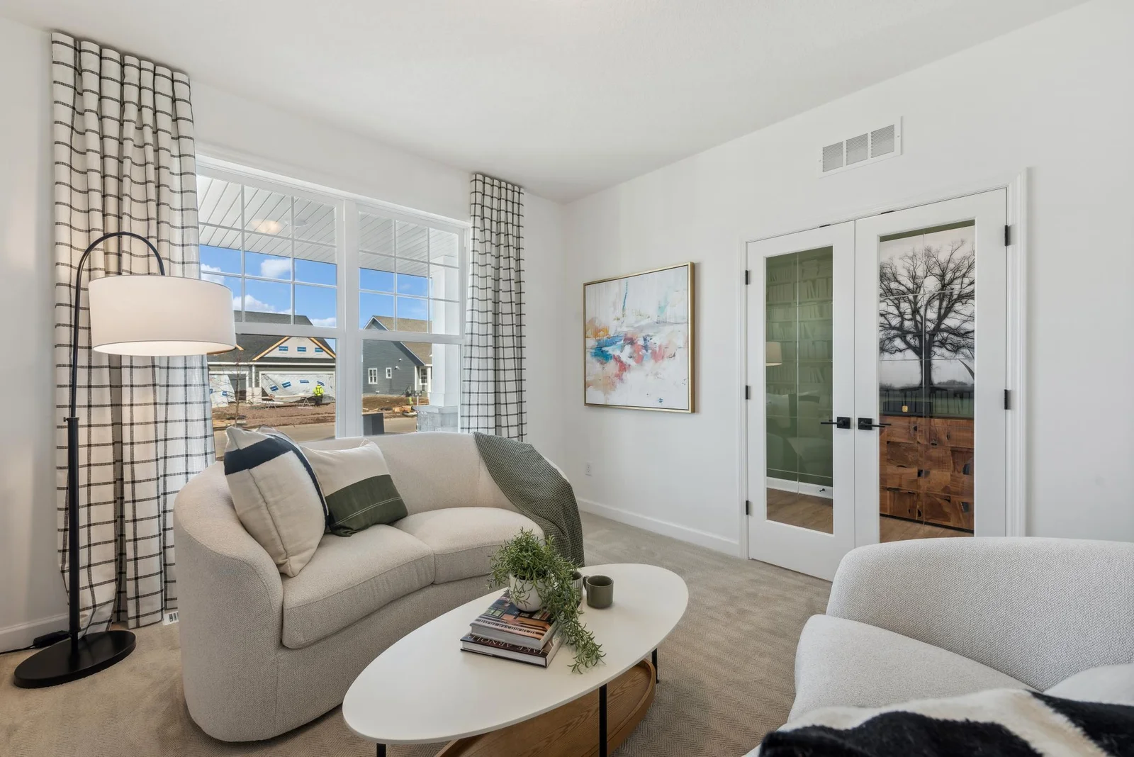 (Photo of decorated model, actual homes finishes will vary) Working from home is a pleasant task when you have a view and light-filled room.