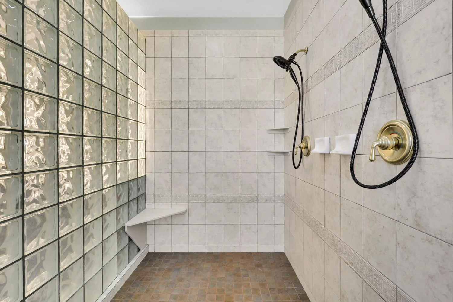 Walk in shower is oversized for two.