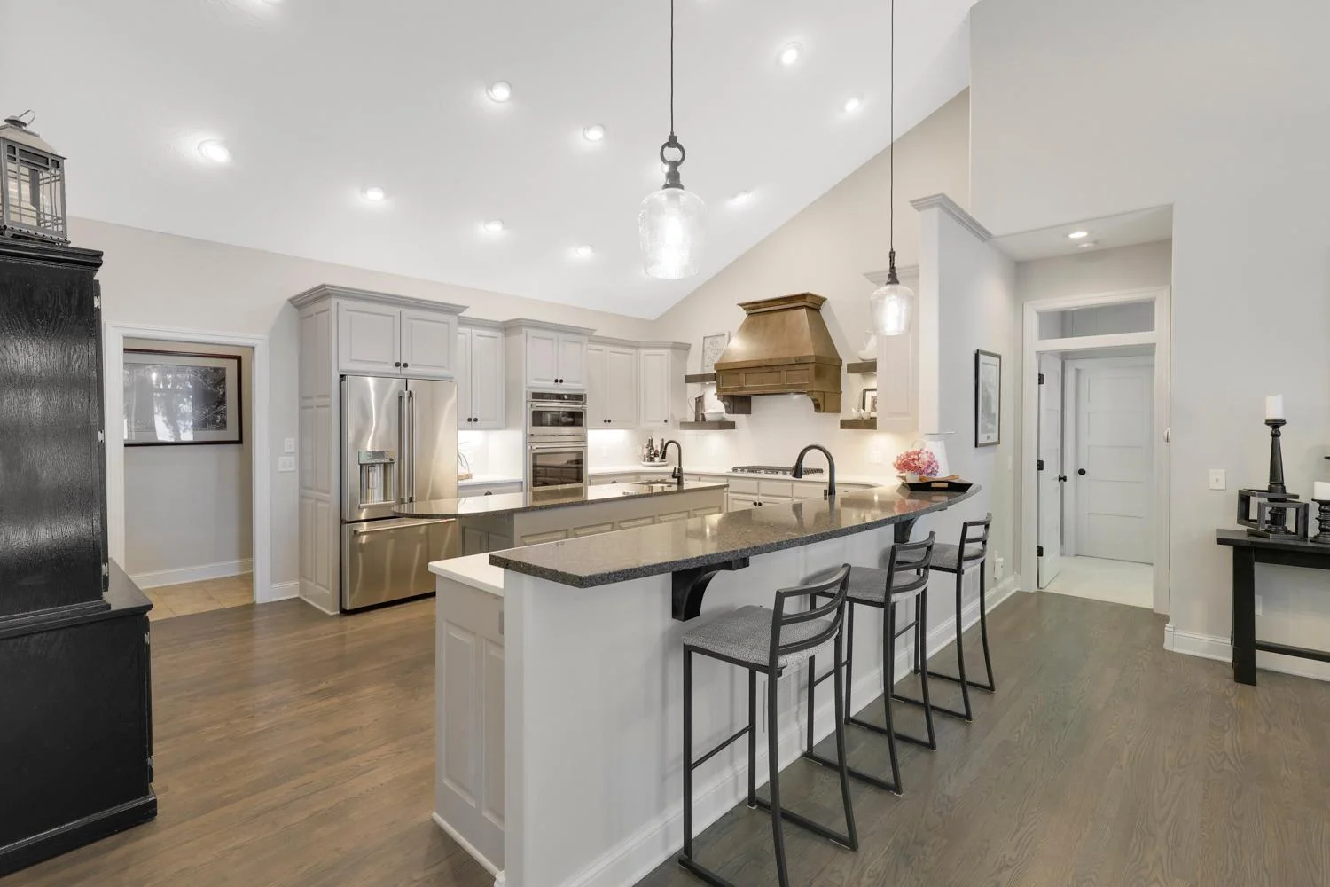 Kitchen upgrades included Cambria and quartz countertops, more hardwood floors and soaring ceilings