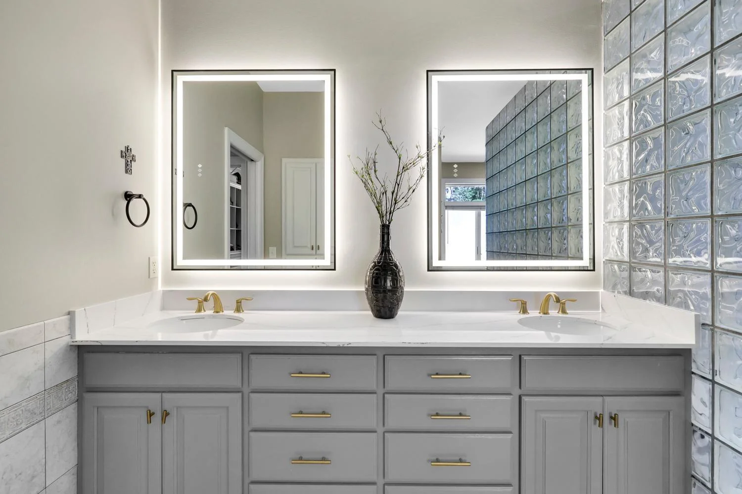 Dual vanity with double LED back lit mirrors with adjustable light effects.