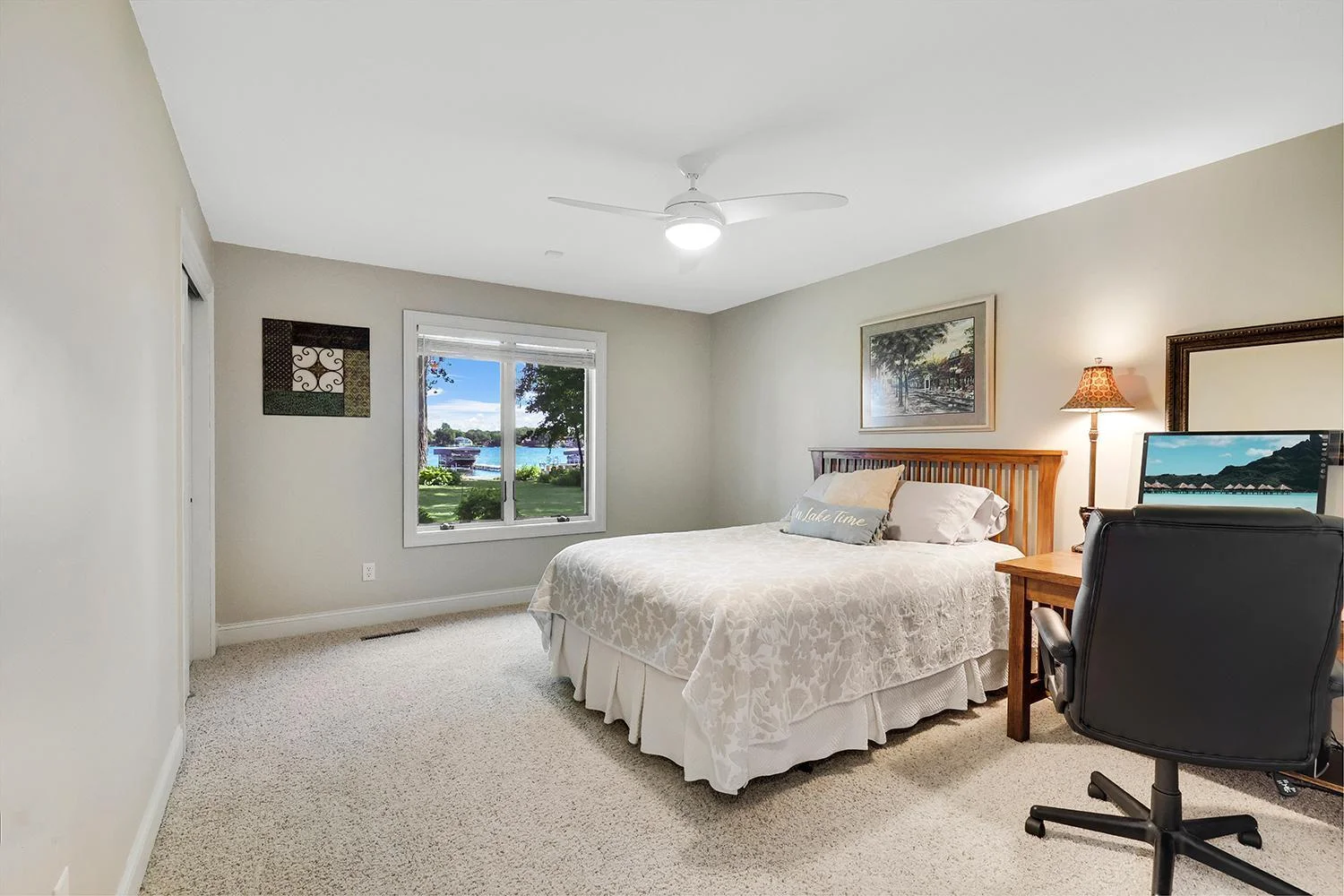 One of three oversized lower-level bedroom with large and deep closets and lake view