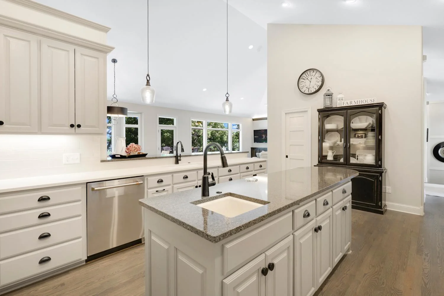 Large center island with vegetable sink, pop up outlet and phone charger
