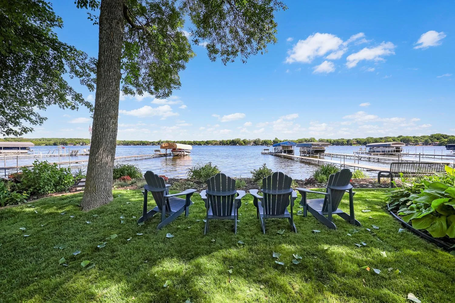 Flat and deep yard is great for entertaining or just sitting lakeside and taking in the view