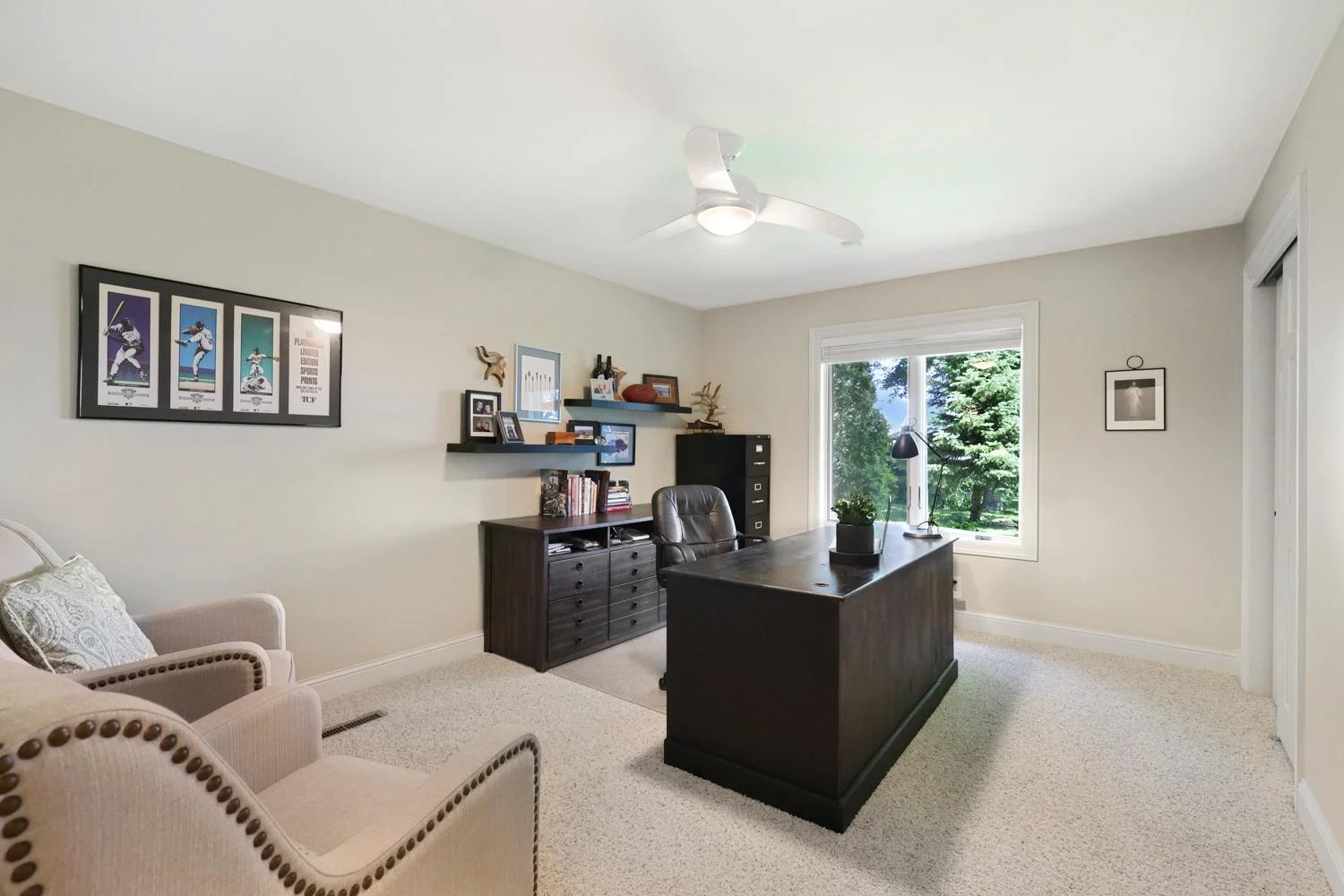 Third Bedroom in the lower level is currently used as an office, remove the chairs and you have room for a king-sized bed!