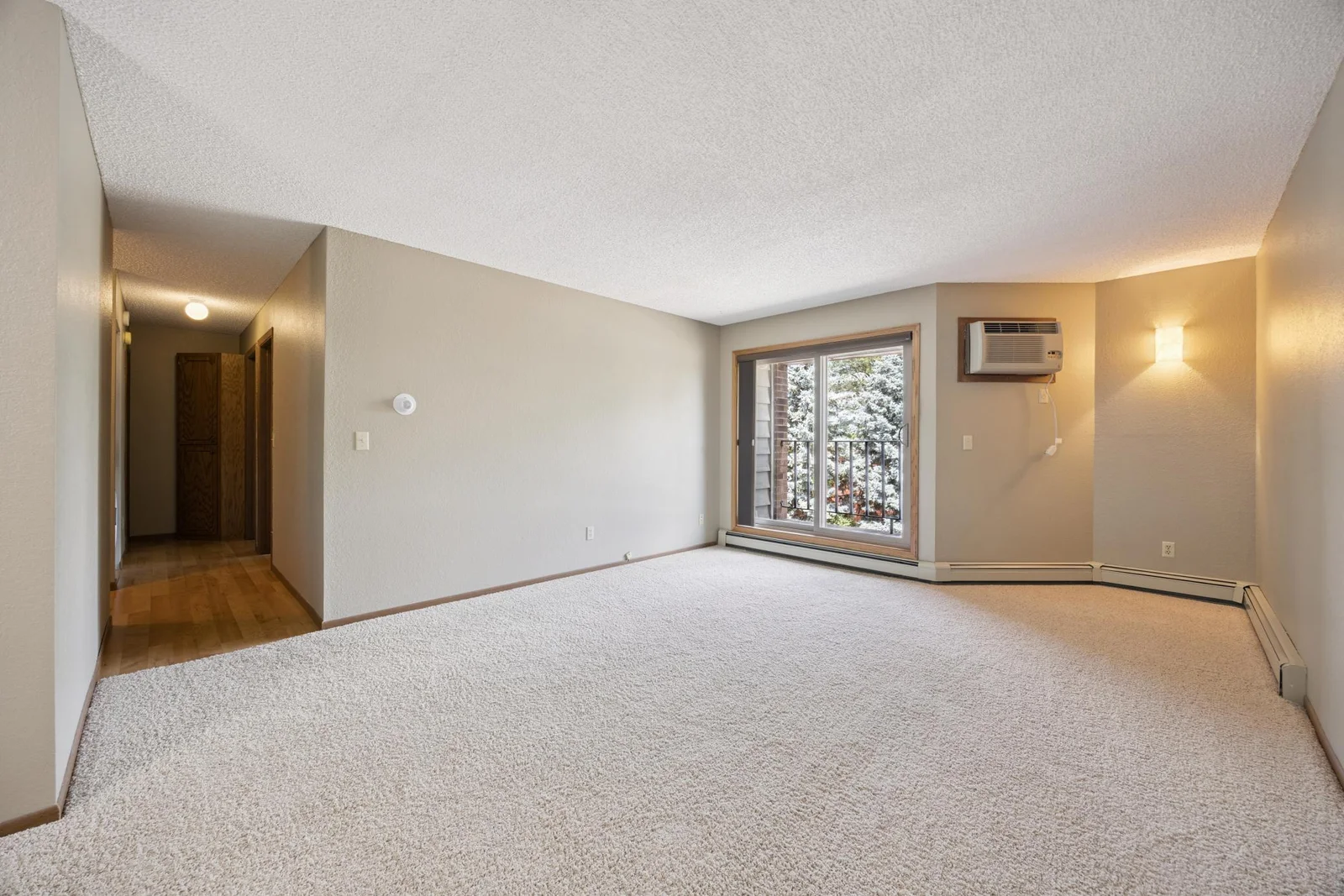 Living room, patio door to balcony