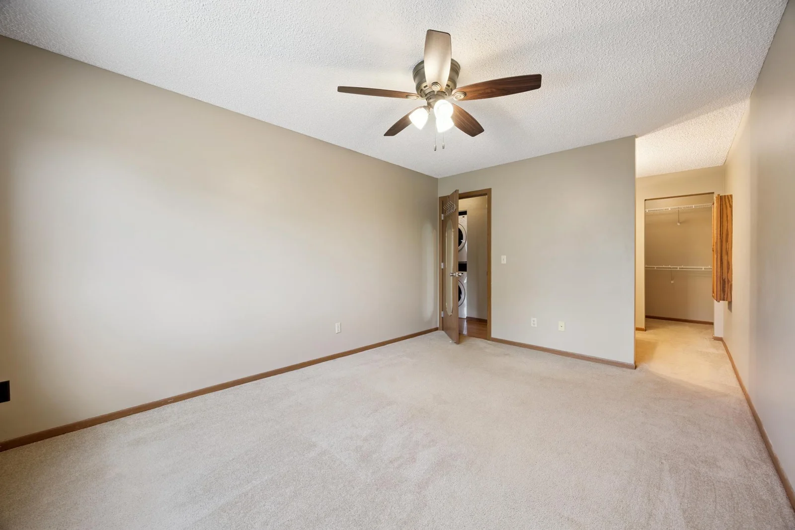 Primary bedroom with walk in 1/2 bath