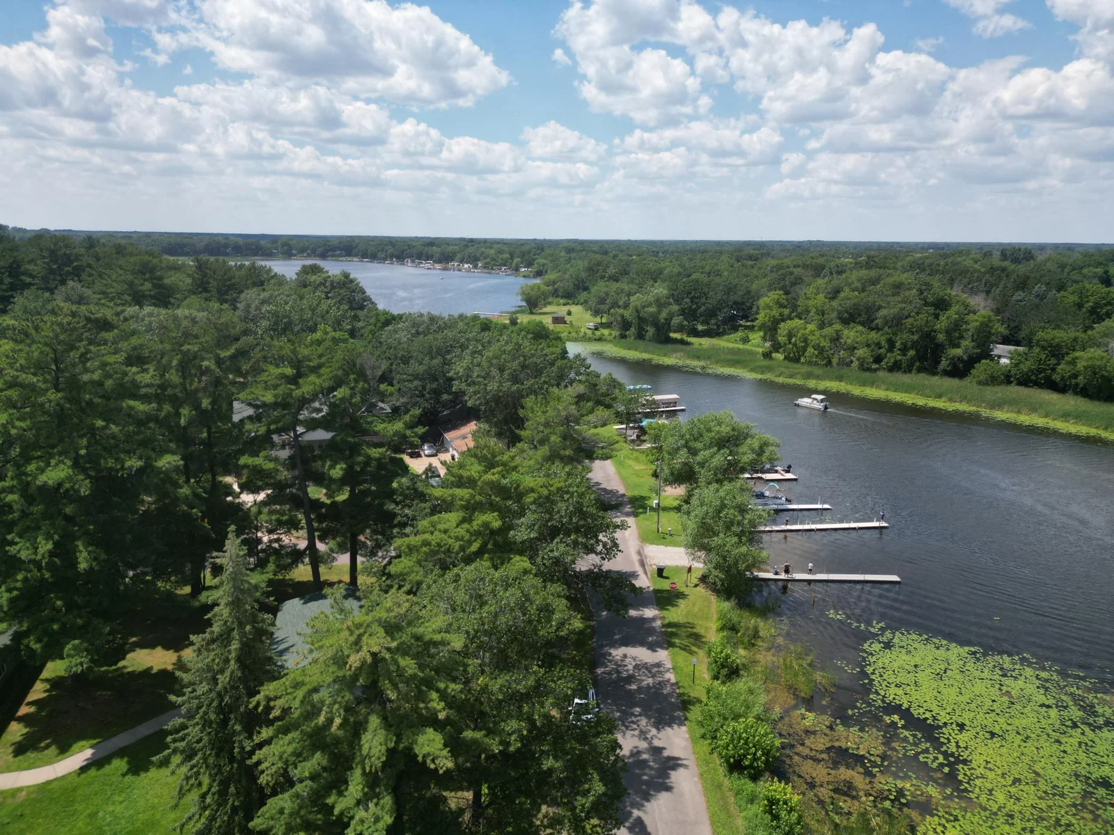 Coon Lake is the largest lake in Anoka county. Membership to the community includes private boat launch access, and 20 ft off lakeshore to use as your private dock area.