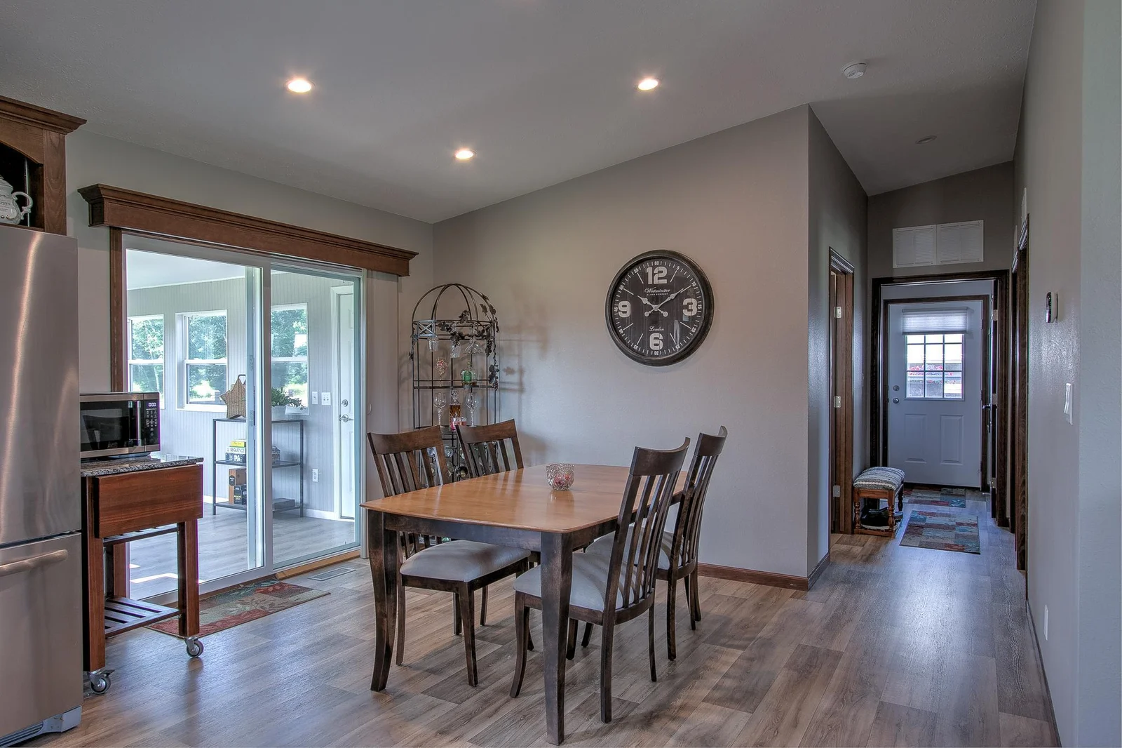 Dining room w/ patio door leading to porch