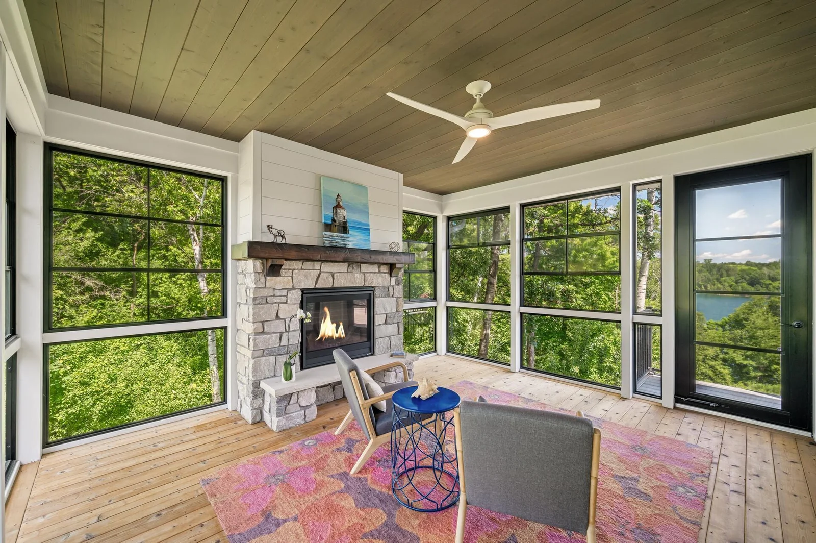 3 season porch, gas fireplace, wired for TV/Cable behind the painting.