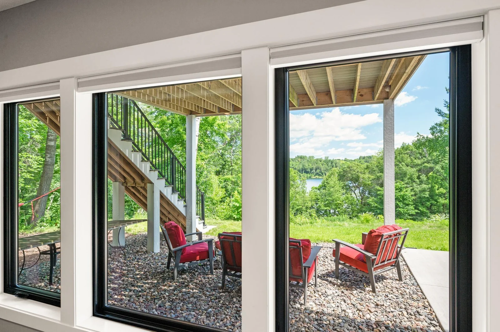 Oversized windows open to outdoor living spaces