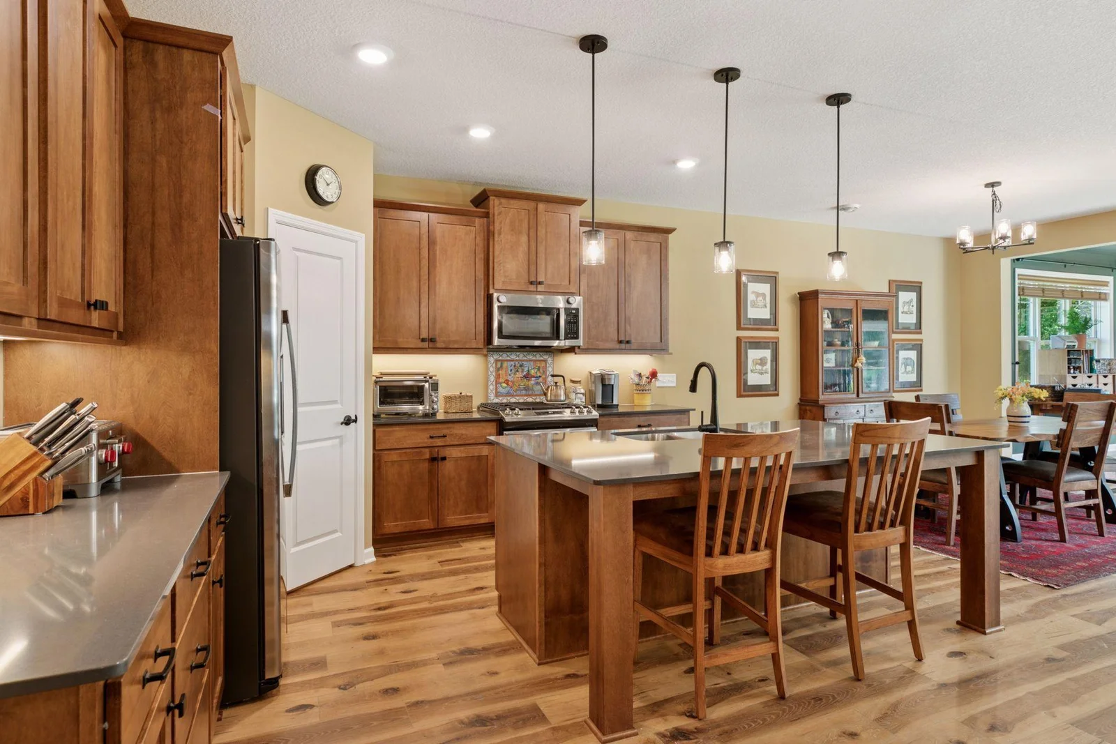 Heart of the home anchored by a beautiful island.