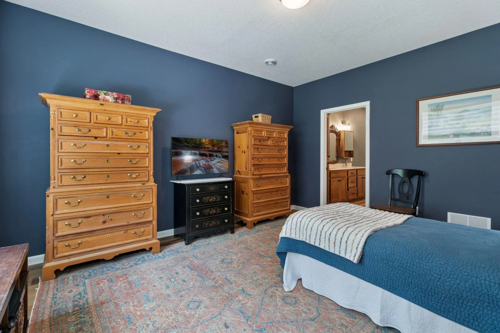 Large dressor's show the size of the bedwall for a Queen or King bed.