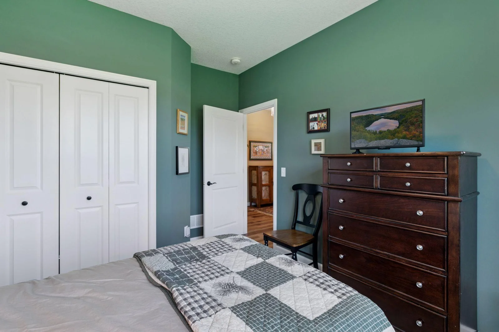 Double door closet and room for a large bureau!
