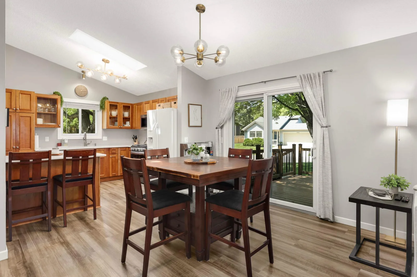Sliding door provides additional natural light and access to the deck.