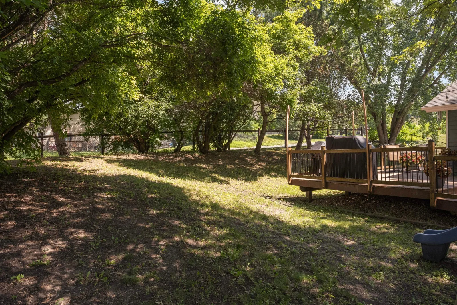 Spacious, fully fenced back yard.