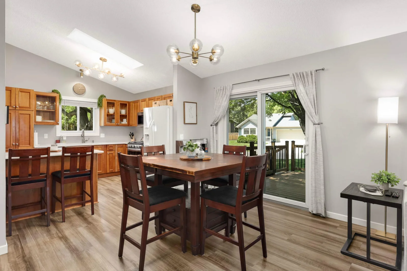 Sliding door provides additional natural light and access to the deck.